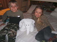 The kids with an elephant towel animal