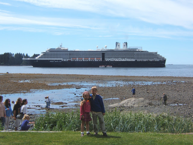 The kids in Alaska with the Oosterdam ship behind