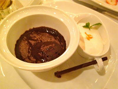 Chocolate souffle with flavored cream