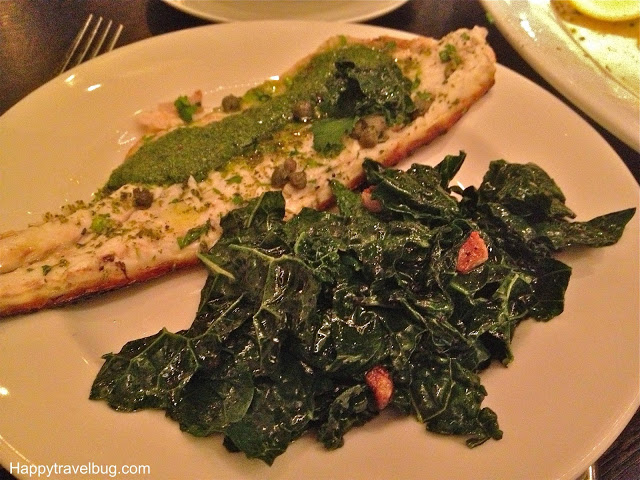 Whole Grilled Branzino with a green sauce and Kale with Pacetta