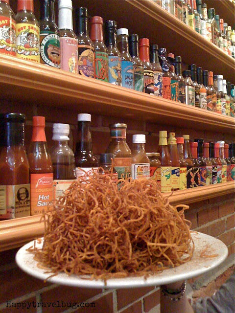 sweet potato nest with hot sauce bottles