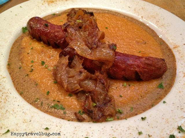 Grilled Andouille Sausage on Sweet Potato Polenta