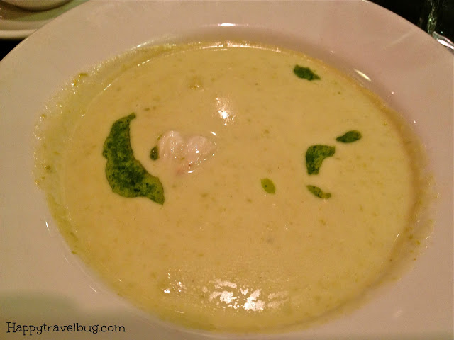 Asparagus bisque with chive oil and crabmeat