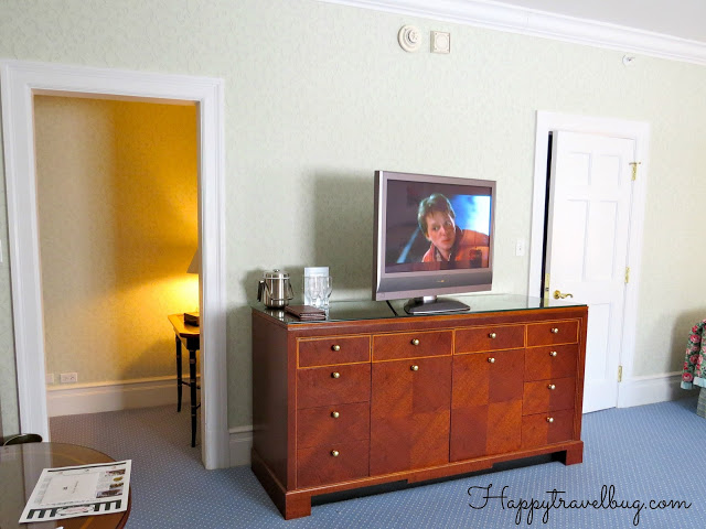 Entrance, entertainment area and closet door in our Greenbrier hotel room