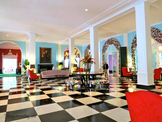 large room at the Greenbrier with a fireplace