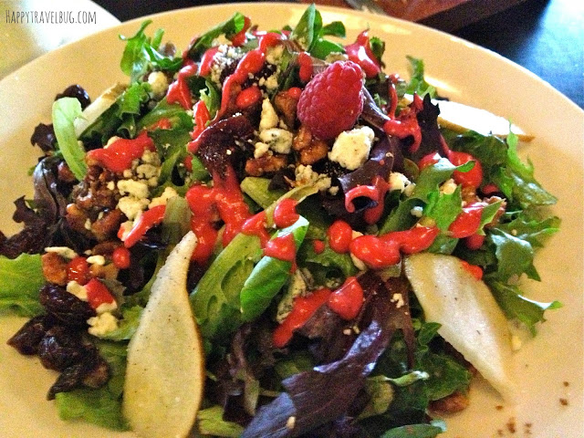 salad of baby green, walnuts, blue cheese, dried cherries, pears