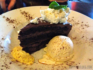 chocolate cake with cream anglaise and ice cream