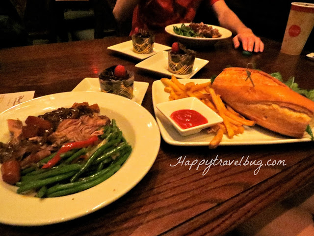 Our lunch at Be Our Guest in Disney World: pork, green beans, chocolate cupcakes