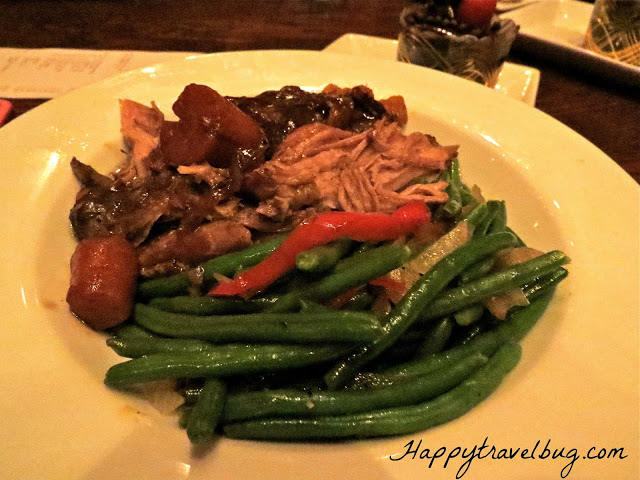slow cooked pork with vegetables and bacon, green beans and mashed potatoes at Be Our Guest