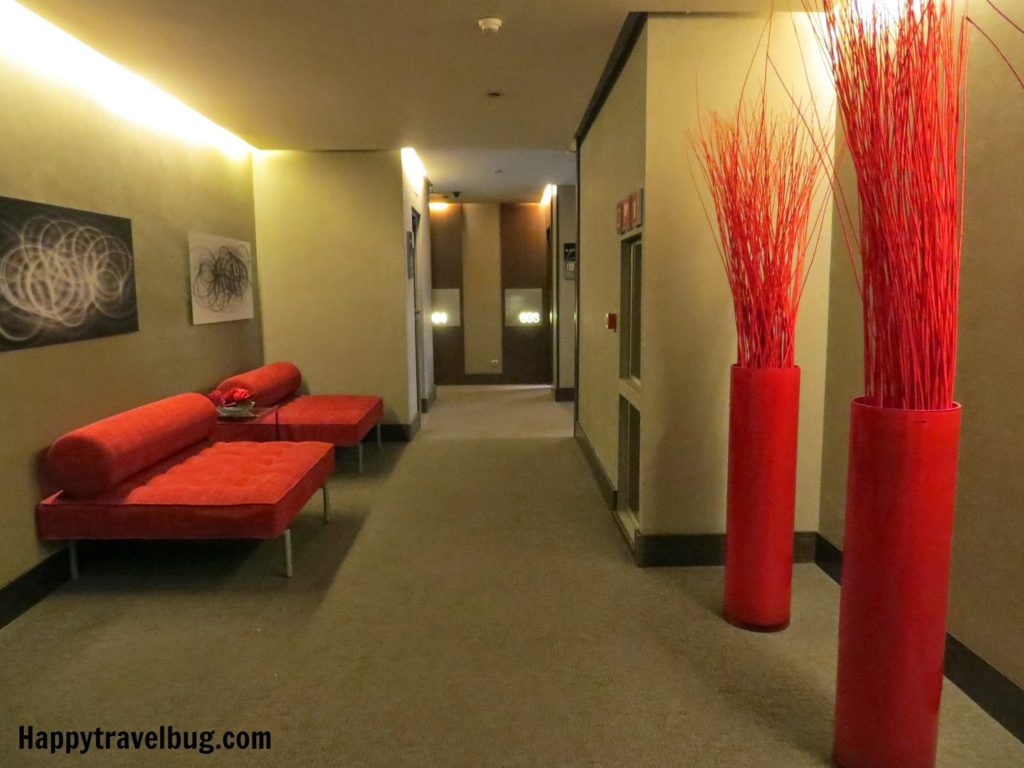 Sixth floor lobby with red accents