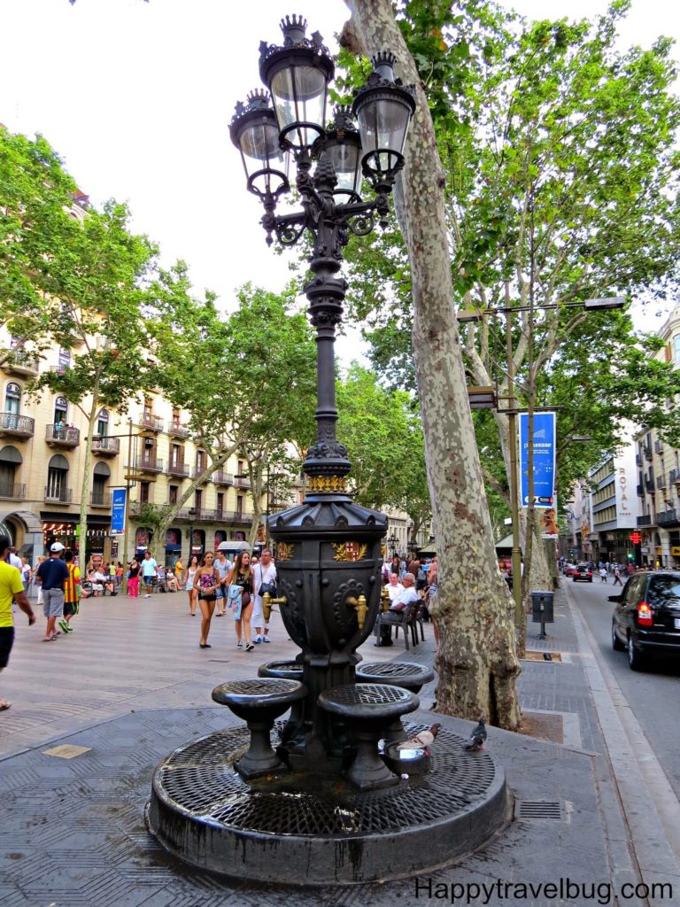  Street light and water fountain all in one on la Rambla in Barcelona, Spain