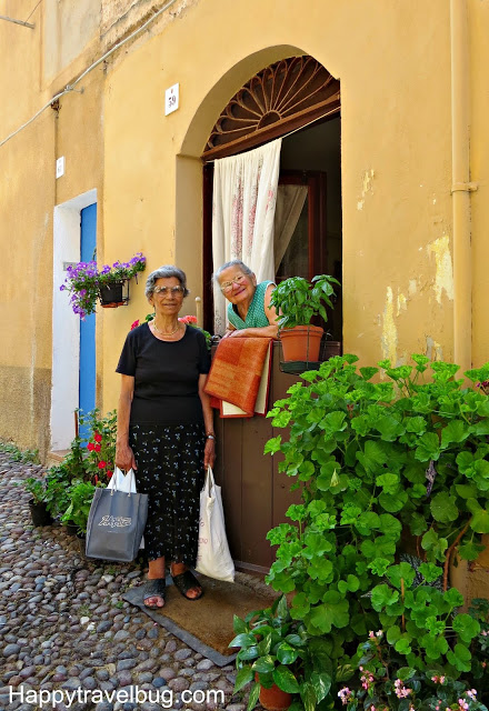 Local women of Alghero, Sardinia, Italy