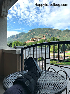 Relaxing on the Broadmoor balcony with my boot