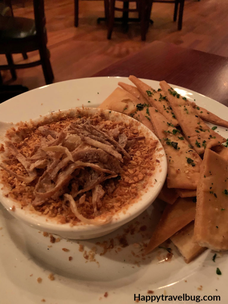 charred onion dip with flatbread chips