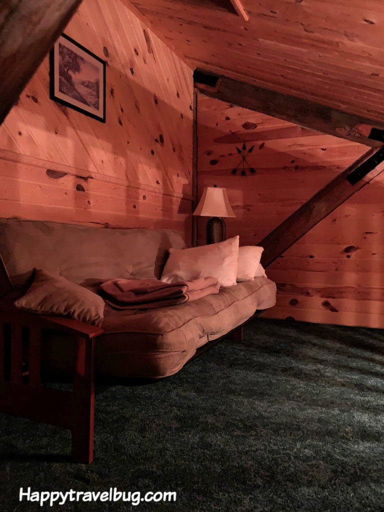 futon in log cabin loft