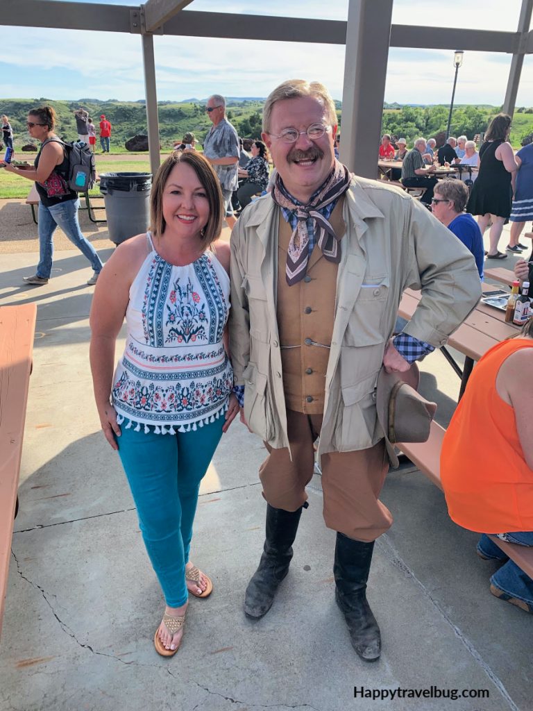 A woman with a Teddy Roosevelt impersonator