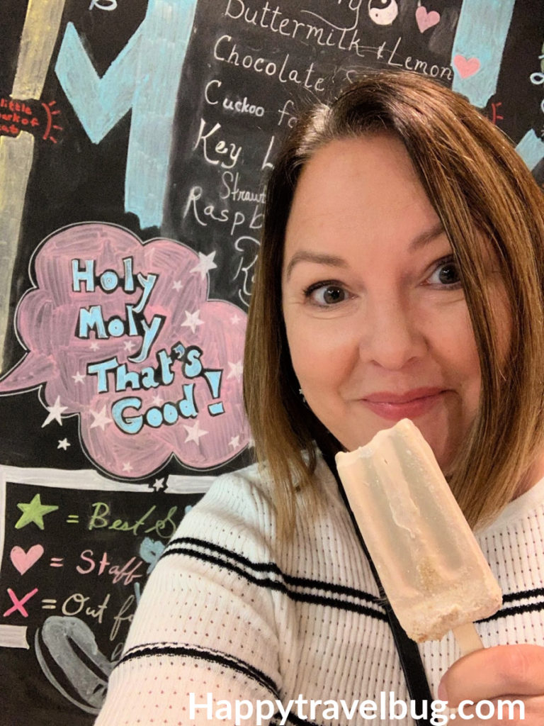 Woman eating a popsicle