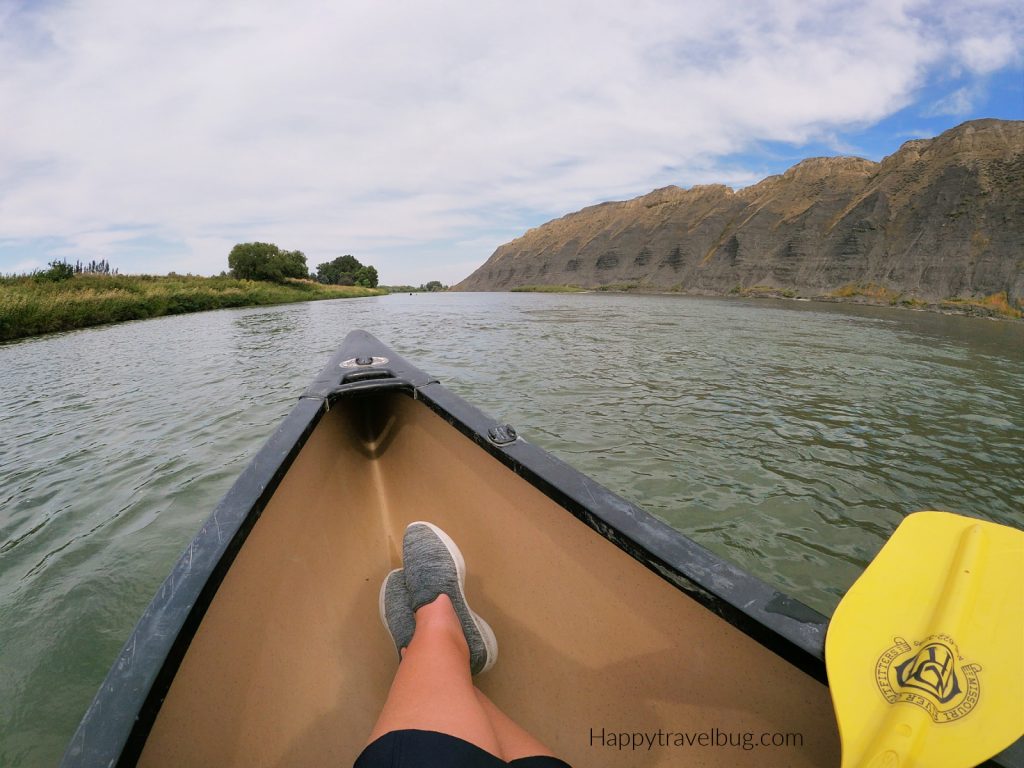 Front of canoe floating down the Missouri River